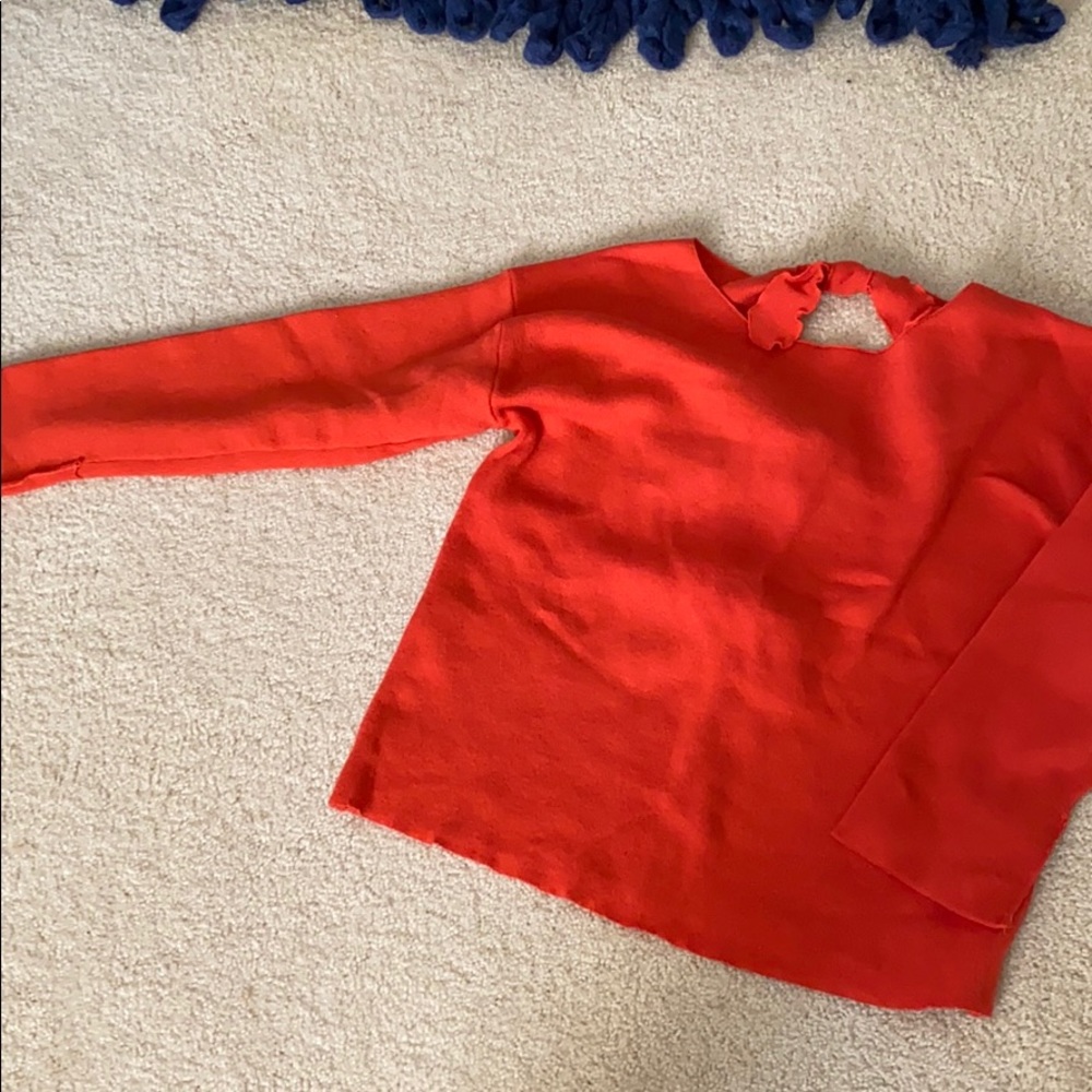 Orange open back sweatshirt